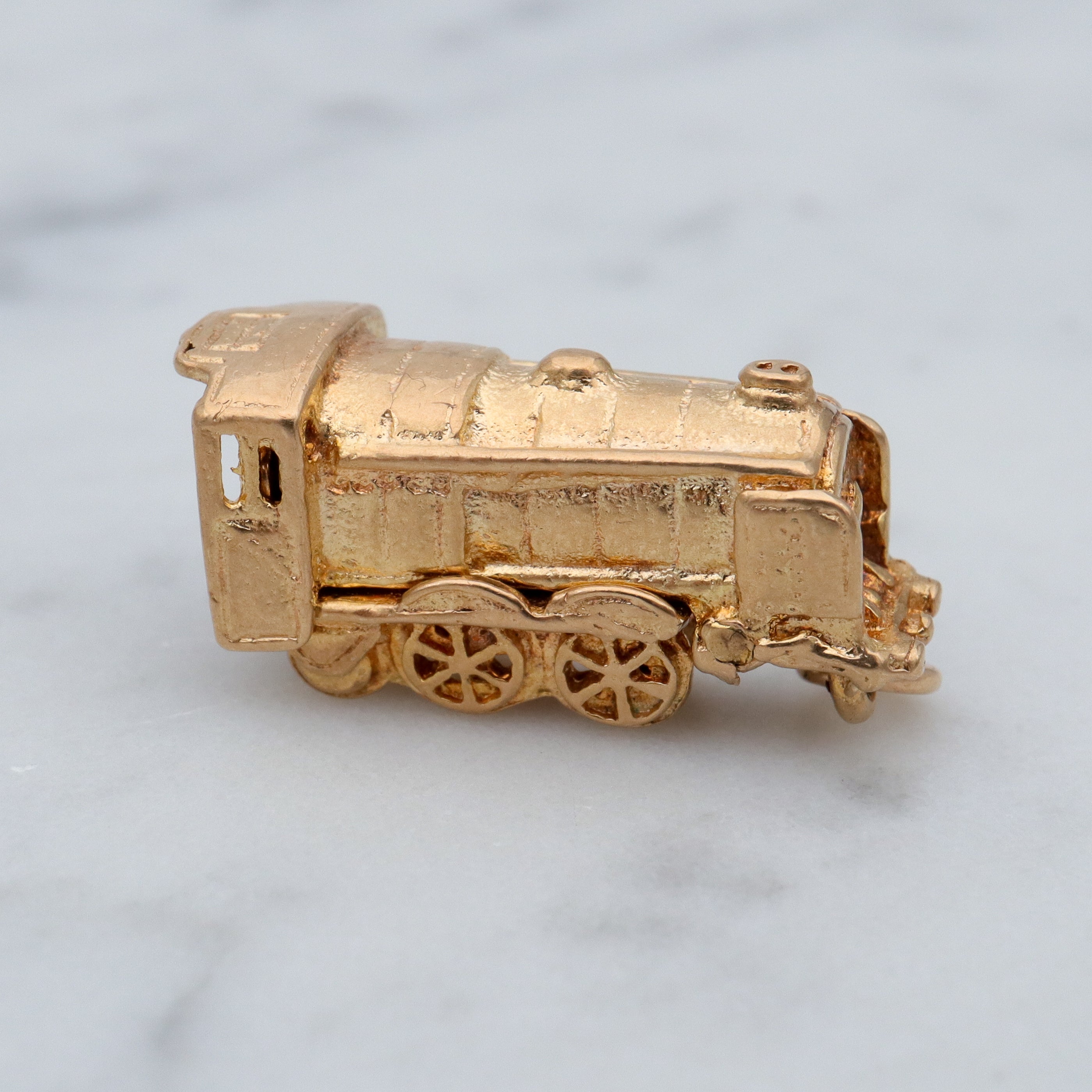 Vintage English 9k gold opening “Bon Voyage” locomotive charm